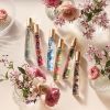 Spray da viaggio per palme all'ibisco AERIN